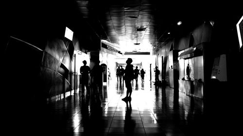 Woman standing against wall