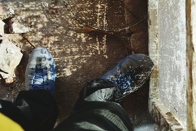 Low section of person standing on ground