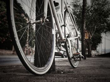 Bicycles parked on street in city