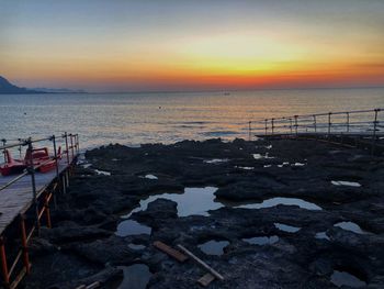 Scenic view of sea against sky during sunset