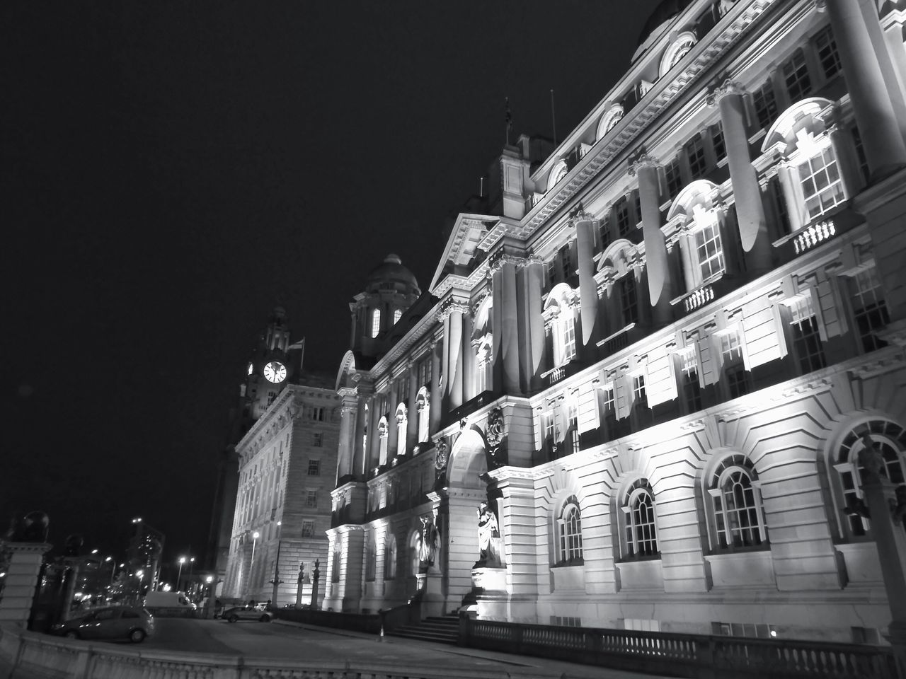 architecture, building exterior, built structure, night, illuminated, residential building, low angle view, residential structure, clear sky, building, city, house, window, outdoors, sky, residential district, facade, no people, city life, street