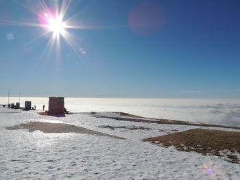 Scenic view of sea against sky during winter