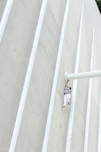 High angle view of people sitting on floor