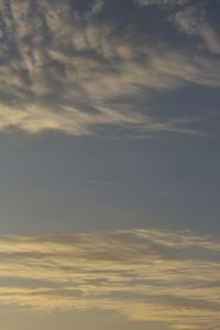 Low angle view of clouds in sky during sunset