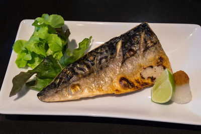 Close-up of fish served in plate