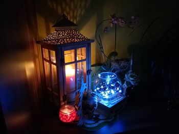 Close-up of illuminated lamp at home