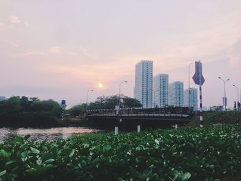 View of buildings against cloudy sky