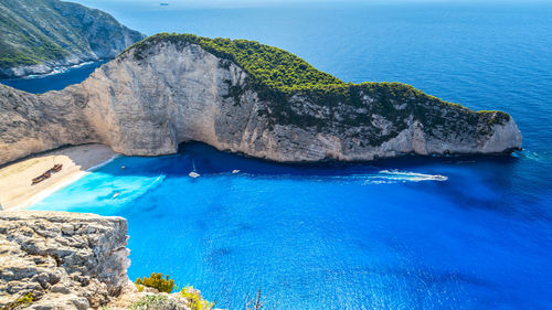 A picturesque bay with a shipwreck on the island of zakynthos in greece.