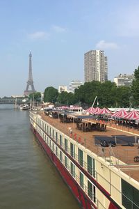 Bridge over river with buildings in background