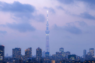 Modern buildings in city against sky