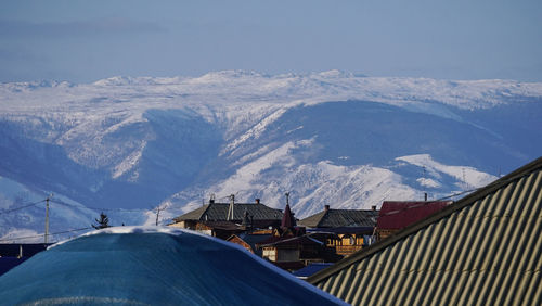 Scenic view of snowcapped mountains against sky