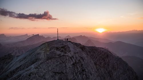 Scenic view of mountains against sky during sunset