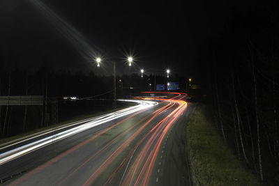 Light trails on road at night