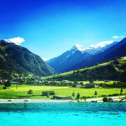 Scenic view of lake against mountain range