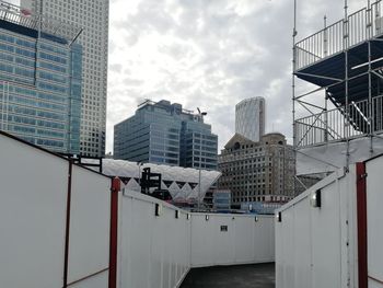 Low angle view of modern buildings against sky in city