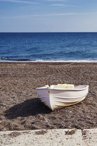 Boat beach and sky