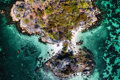 High angle view of rocks in sea