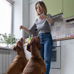 Woman with dog at home