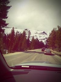 Road seen through car windshield