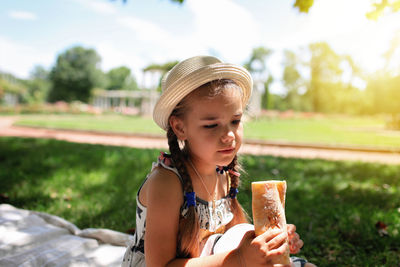 Portrait of girl holding ice cream