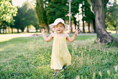 Portrait of a girl on field