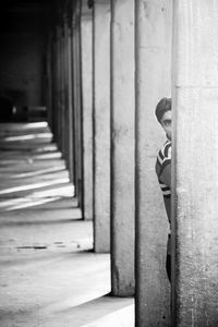 Portrait of man standing in building