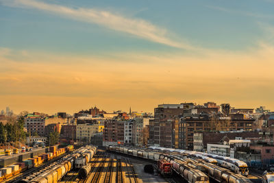 High angle view of buildings against sky during sunset