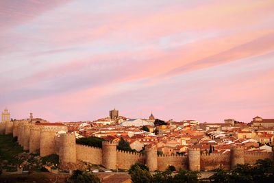 Fortified wall at avila against sky