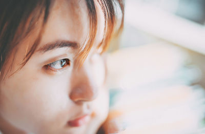 Close-up of girl looking away