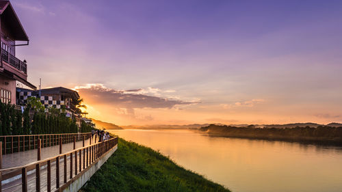 Scenic view of lake against sky during sunset