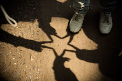 Low section of people standing on floor