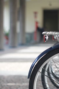 Close-up of bicycle on street