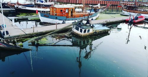 Boats moored in harbor