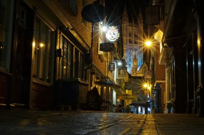 Illuminated street at night