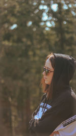 Portrait of young woman in forest