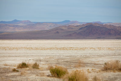 Scenic view of desert against sky