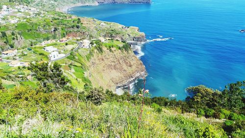 Scenic view of sea against blue sky