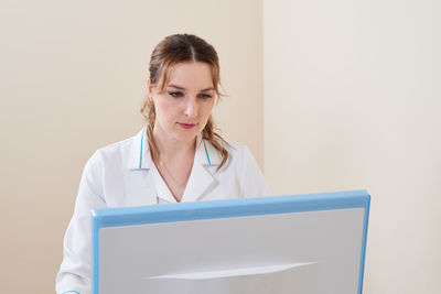 Doctor using computer at hospital