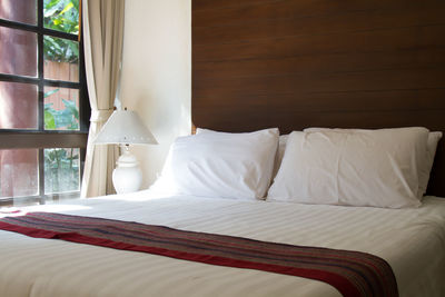View of bed in bedroom at home