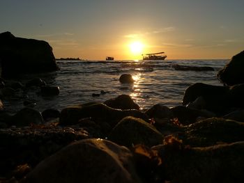 Scenic view of sea against sky during sunset