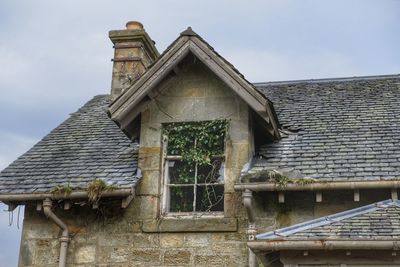 Low angle view of old building against sky