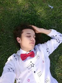 High angle view of young woman on field