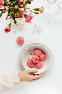 High angle view of pink roses on table