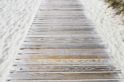 High angle view of boardwalk on footpath