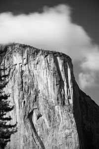 Low angle view of drying on mountain against sky