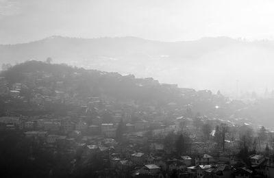 High angle view of townscape against sky in city
