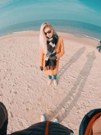 Woman wearing sunglasses on beach