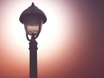 Low angle view of street light against clear sky