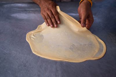 High angle view of man preparing food