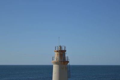 Scenic view of sea against blue sky